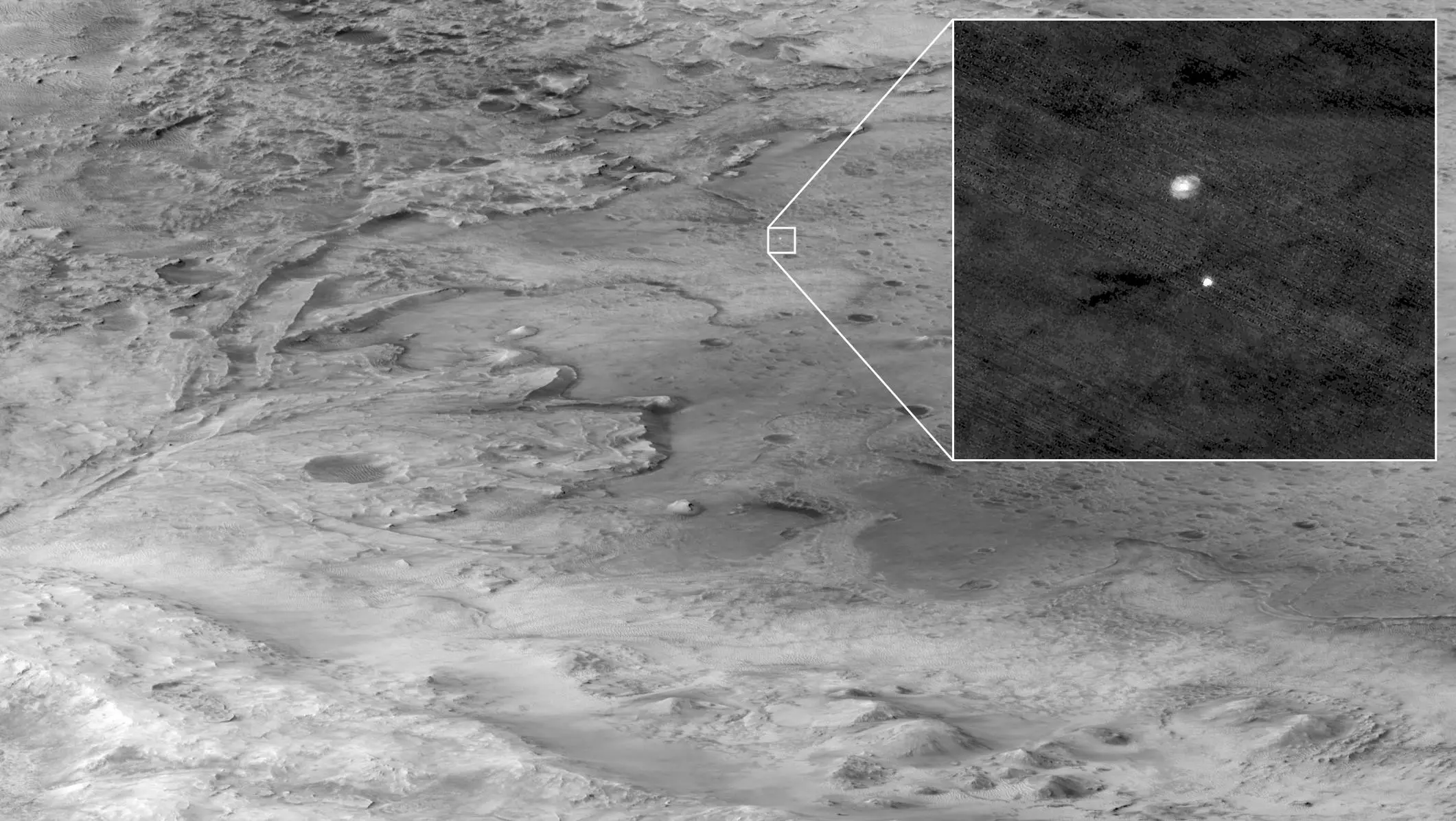 NASA火星侦察轨道器上的HiRISE相机拍摄的正在降落中的毅力号火星车